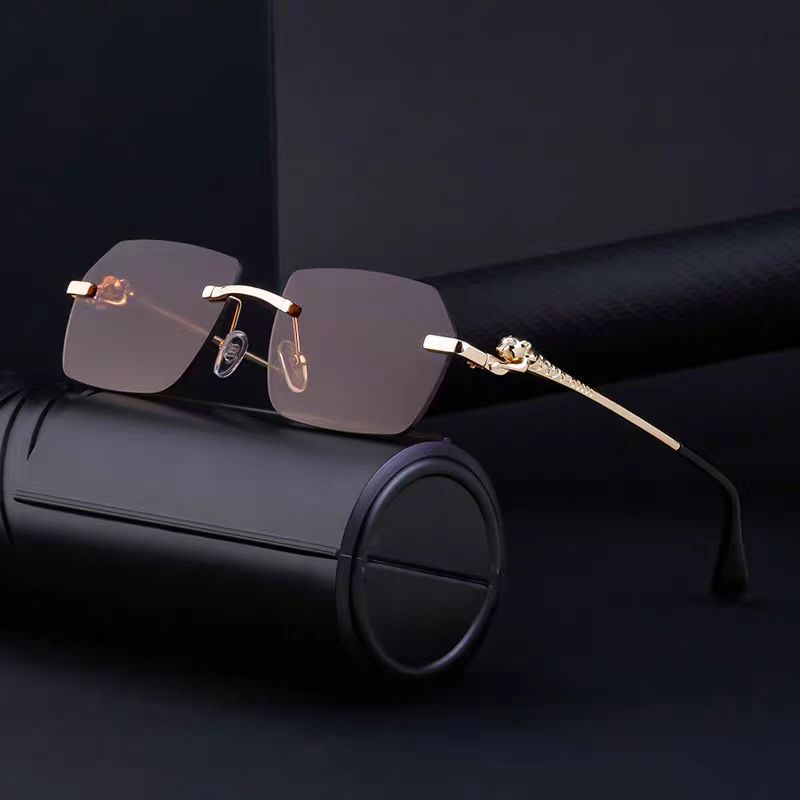 Gold frame Cheetah Rimless sunglasses by FitiqueFit featuring a stylish, hip-hop inspired eyewear design with sleek rimless lenses.
