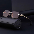 Gold frame Cheetah Rimless sunglasses by FitiqueFit featuring a stylish, hip-hop inspired eyewear design with sleek rimless lenses.