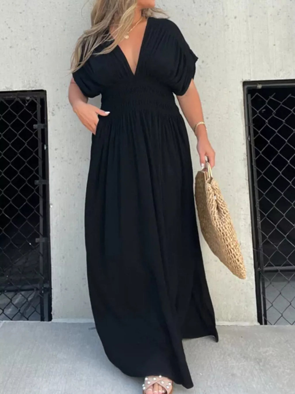 Plus size maxi dress with slit V-neck, smocked waist, full-length design, by Trendsi, featuring flowing fabric and elegant style.