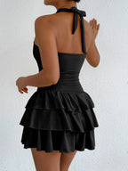 Halter neck ruffle layered dress by Plush Fashion Hub featuring a stylish design with ruffles and a flattering fit.