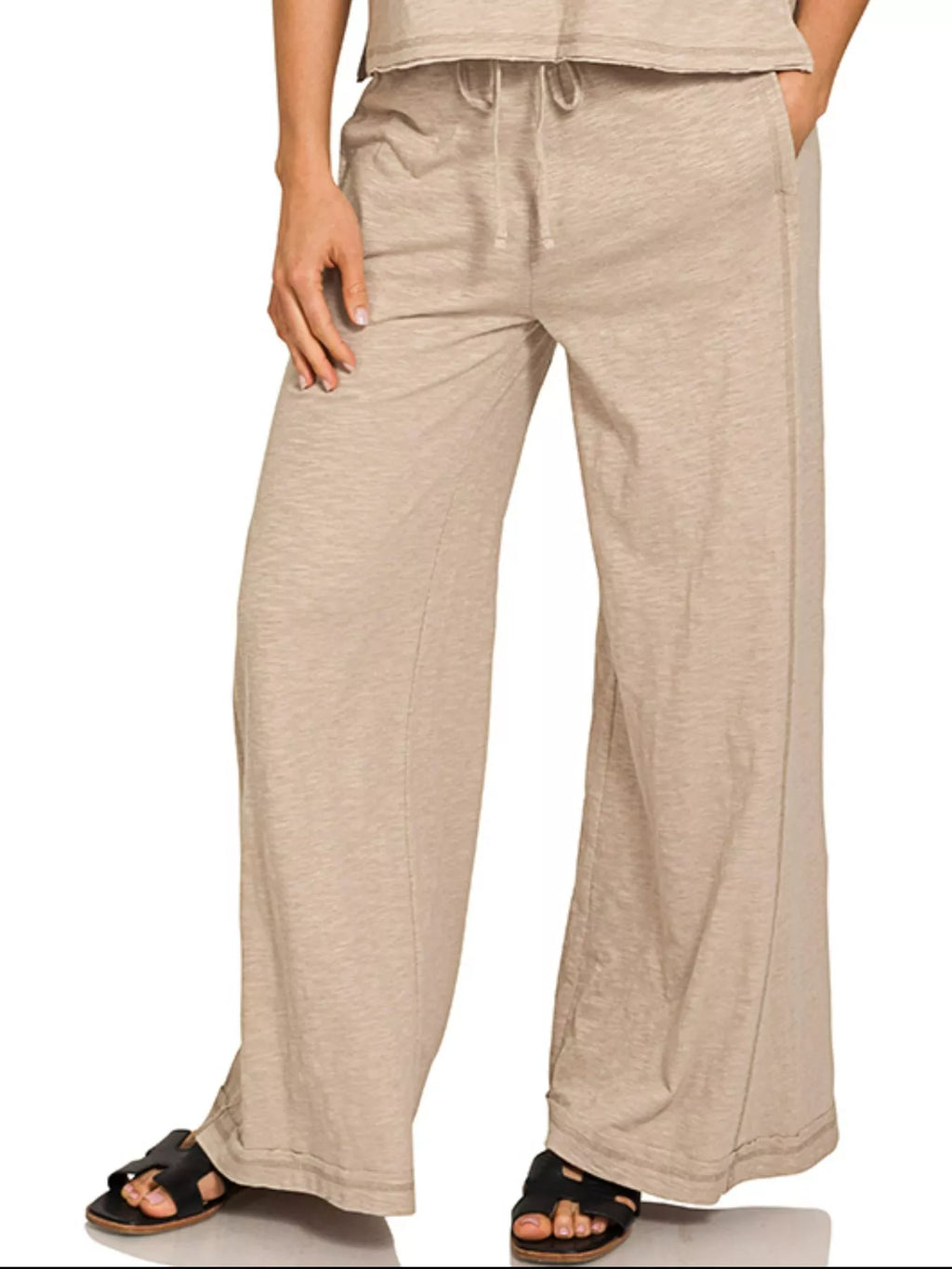 Women's cotton slub short sleeve tee and lounge pants set by Trendsi, featuring comfortable fabric and relaxed fit for casual wear.