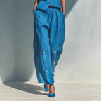 Women's gold-buckle camisole and pants two-piece casualwear set by FitiqueFit, featuring a stylish camisole top and matching pants.