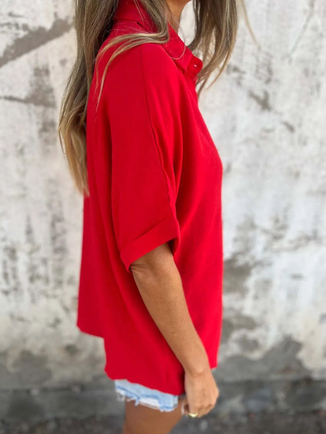 Women's collared half sleeve button-down shirt from Trendsi, stylish office blouse with a sophisticated look and classic design.