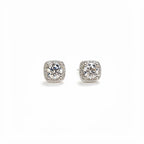 Sterling silver stud earrings with 1 carat moissanite gemstones, showcasing sparkling, round-cut jewelry from Shopimist.