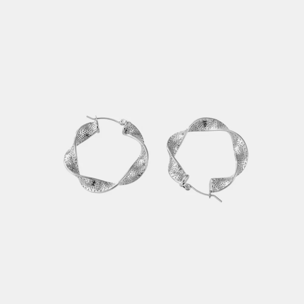 Titanium steel twisted earrings with a sleek, modern design, perfect for stylish clothing and fashion accessories.