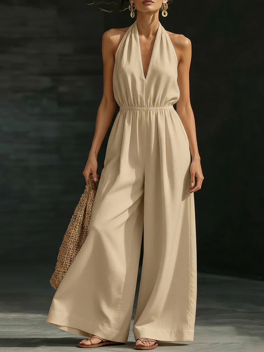 V-neck halter neck jumpsuit for women by Plush Fashion Hub, featuring a stylish design, sleeveless cut, and fitted waist.