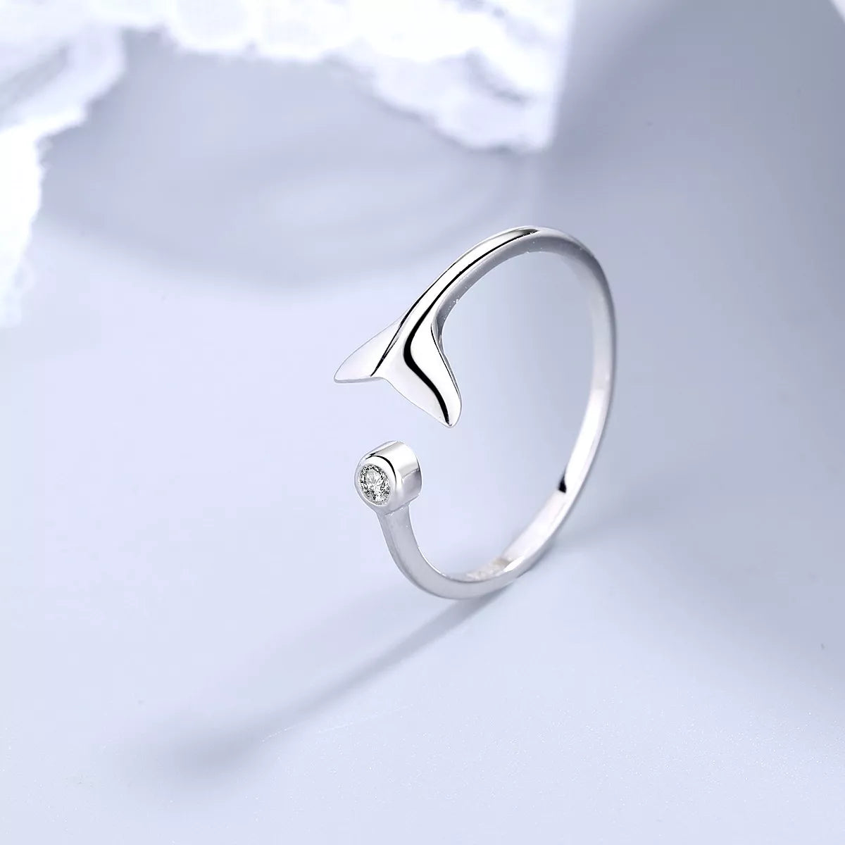 Sterling silver whale tail ring by Shopimist featuring a detailed, polished design on a smooth band.