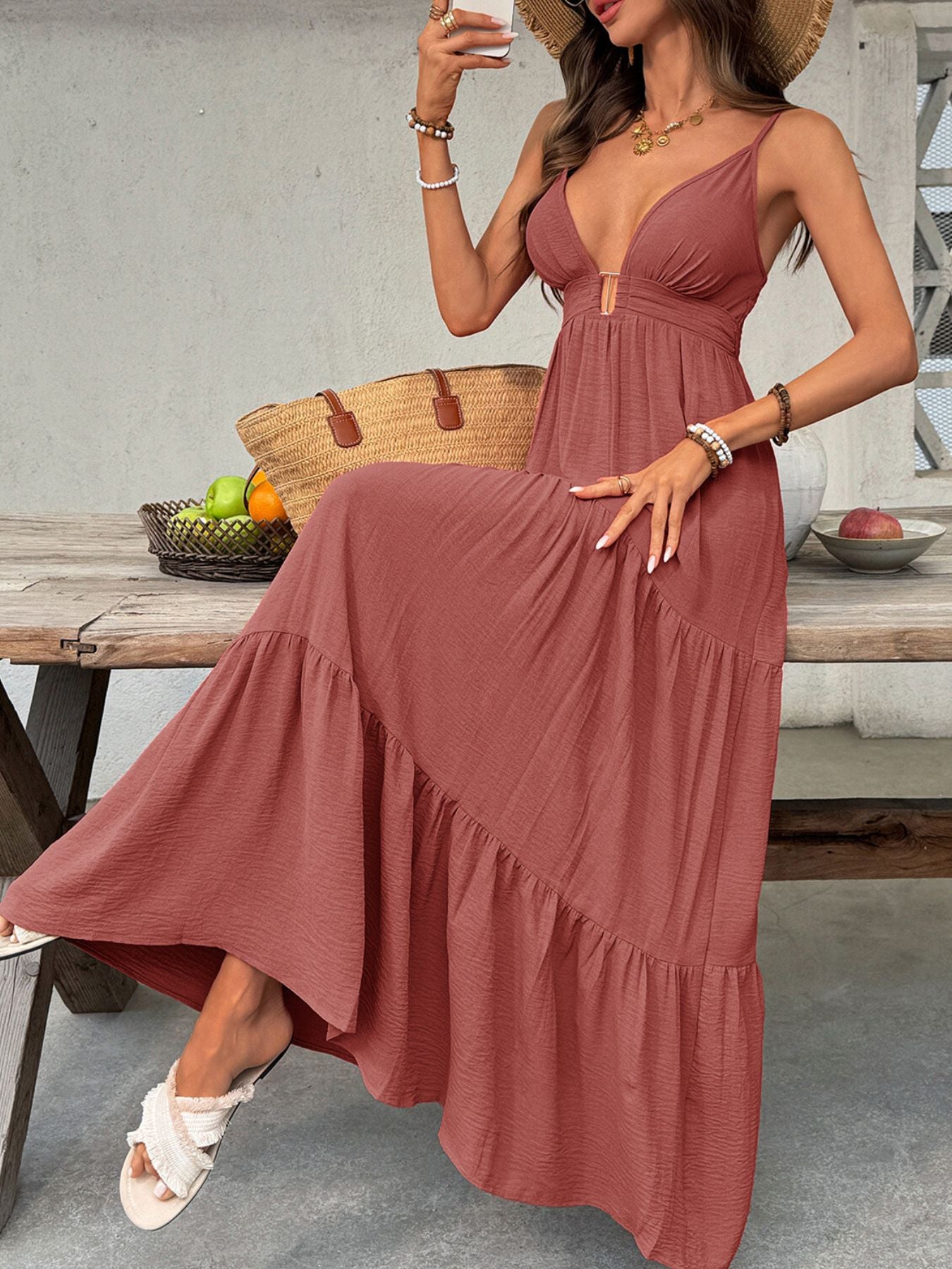 Women's deep V-neck tiered maxi dress by Plush Fashion Hub featuring a flowy, smocked boho beach dress style.