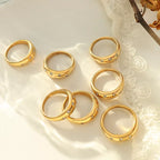 18K gold-plated zircon ring with sparkling stones, showcasing elegant jewelry design and intricate detailing.