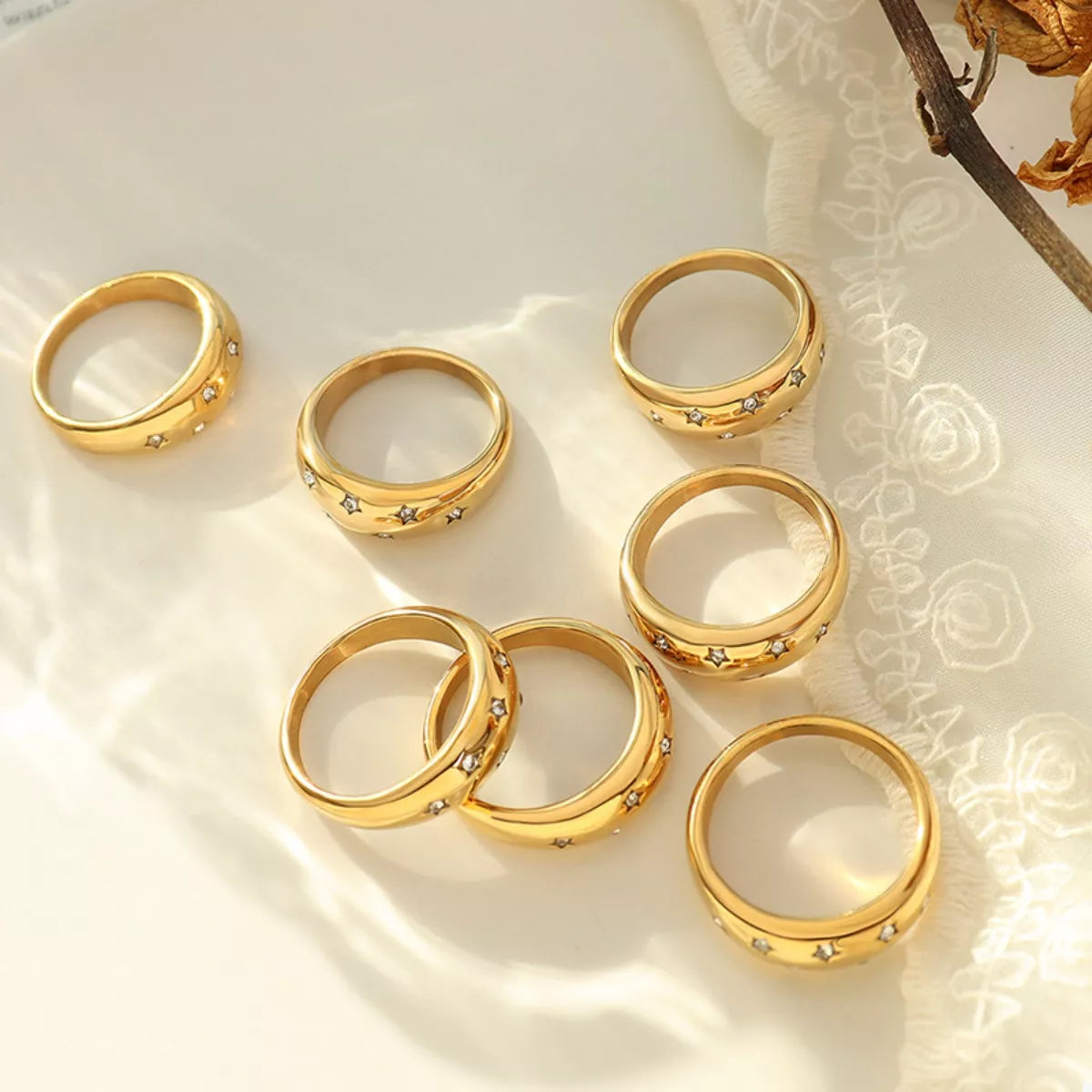 18K gold-plated zircon ring with sparkling stones, showcasing elegant jewelry design and intricate detailing.