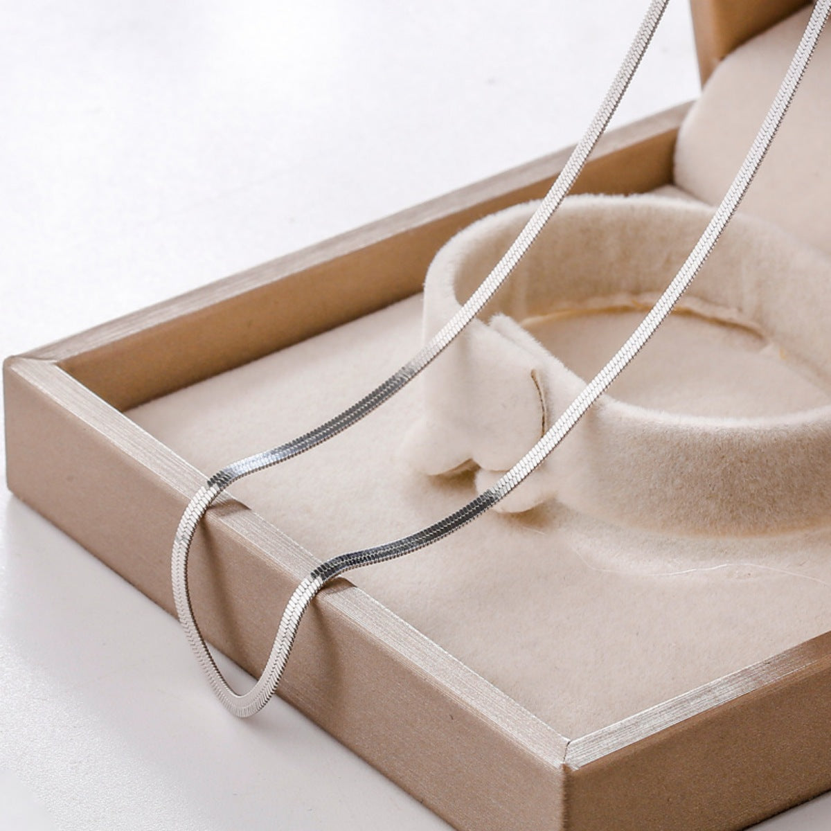 Sterling silver chain necklace from Plush Fashion Hub, showcasing a sleek and stylish design on a plain background.