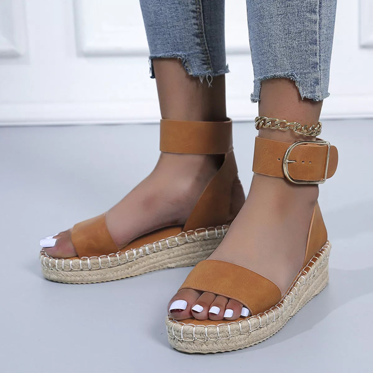 Open toe openwork sandals by Shopimist featuring intricate cutout design and comfortable flat sole.