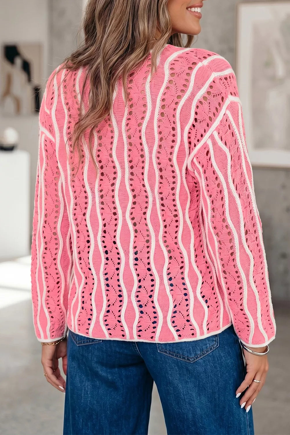 Wavy detail hollow out knit long sleeve sweater for women, stylish Trendsi knit sweater with textured wavy accents.