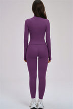 Fitglutes activewear 3-piece set featuring a Kinetic Zip Jacket, cross-back sports bra, and matching leggings for workout comfort.