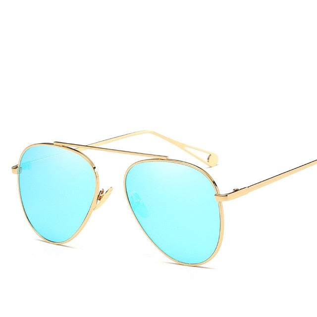Luxury Plush Fashion Hub women's pilot sunglasses with vintage aviation-style frames and dark tinted lenses.