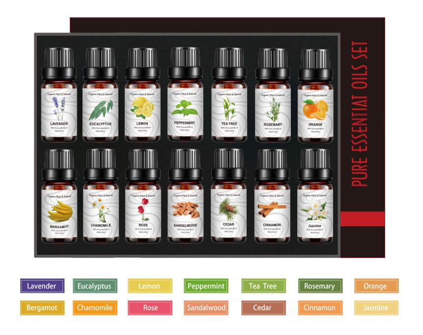 Fourteen amber glass bottles of essential oils with black caps, in a gift box, labeled with various scents.