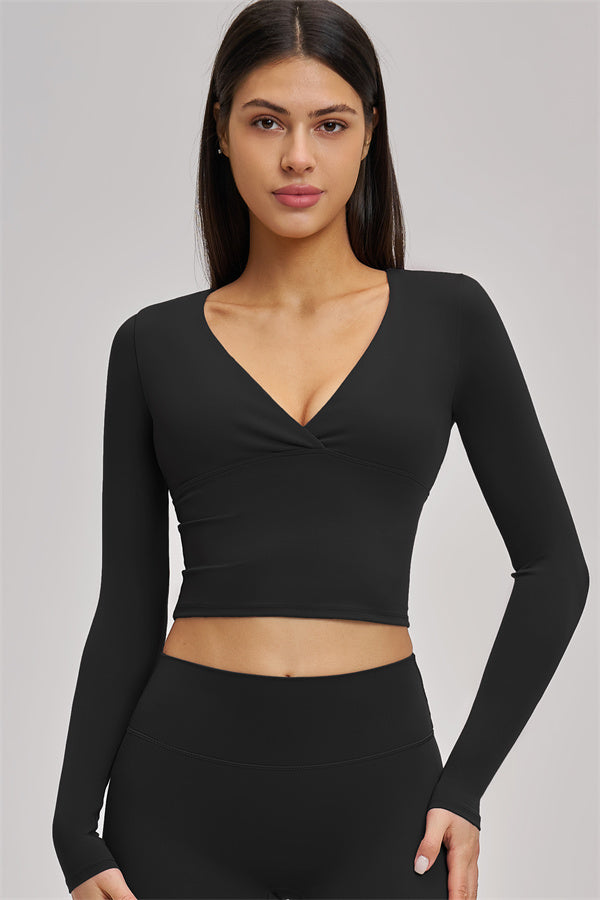 Fitglutes Activewear long sleeve crop top from The Swoon collection, stylish gymwear with a fitted design and breathable fabric.
