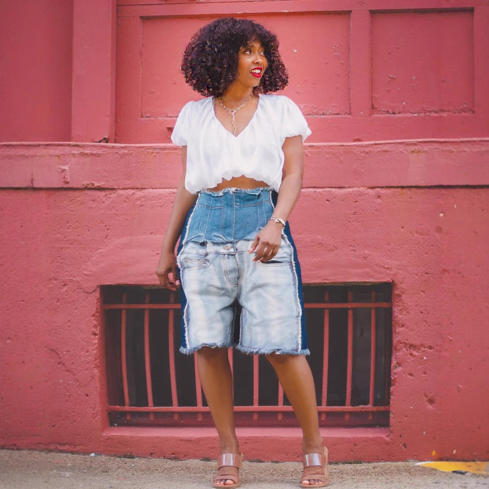 High-waist distressed patchwork denim jeans by Plush Fashion Hub, showing front view with ripped details and patchwork design