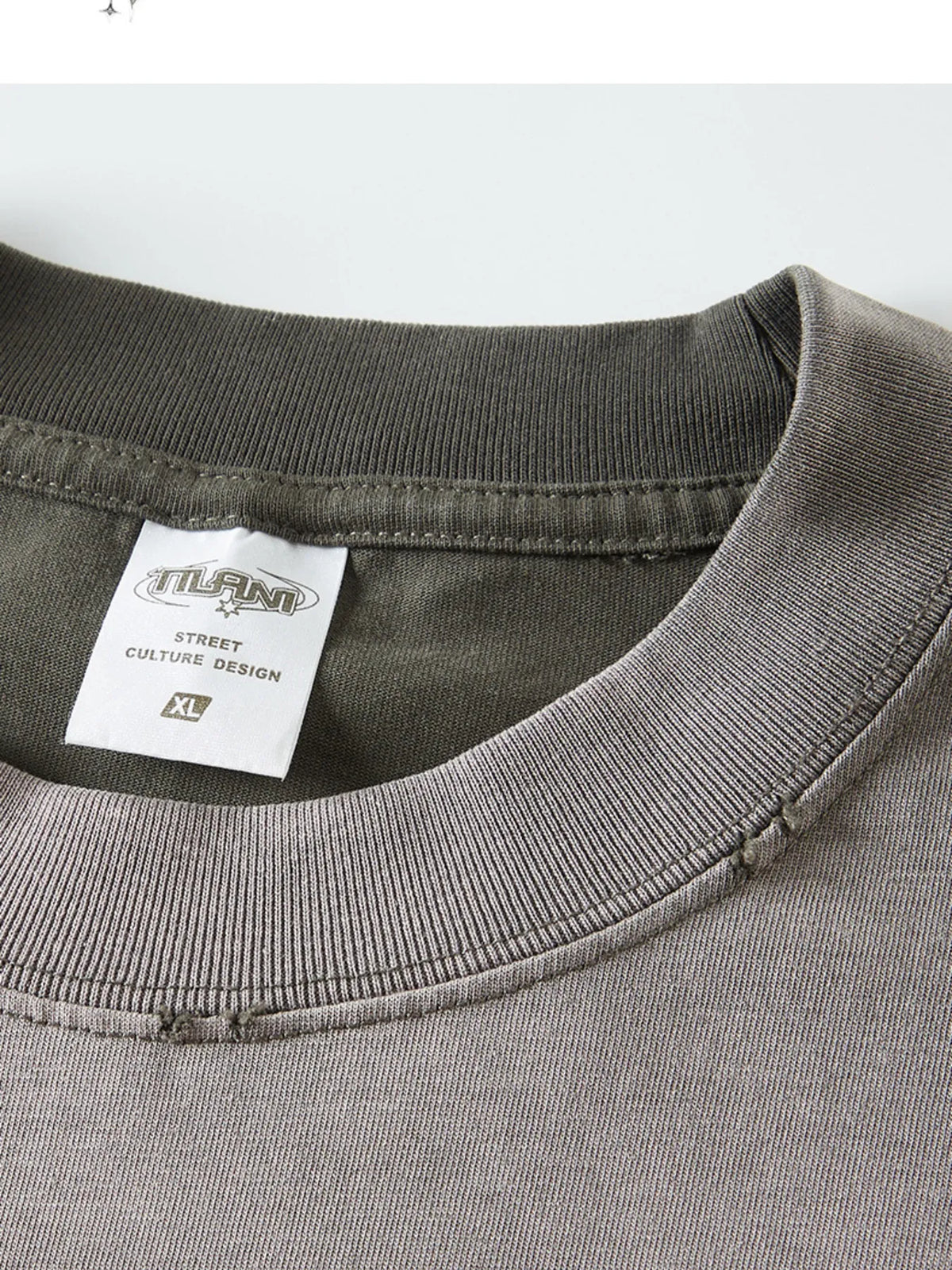 Men's graphic round neck short sleeve T-shirt by Trendsi, featuring a bold graphic design on soft cotton fabric.