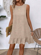 Women's ruffle lace-up mini dress with short sleeves, loose fit, perfect for beachwear by Plush Fashion Hub.