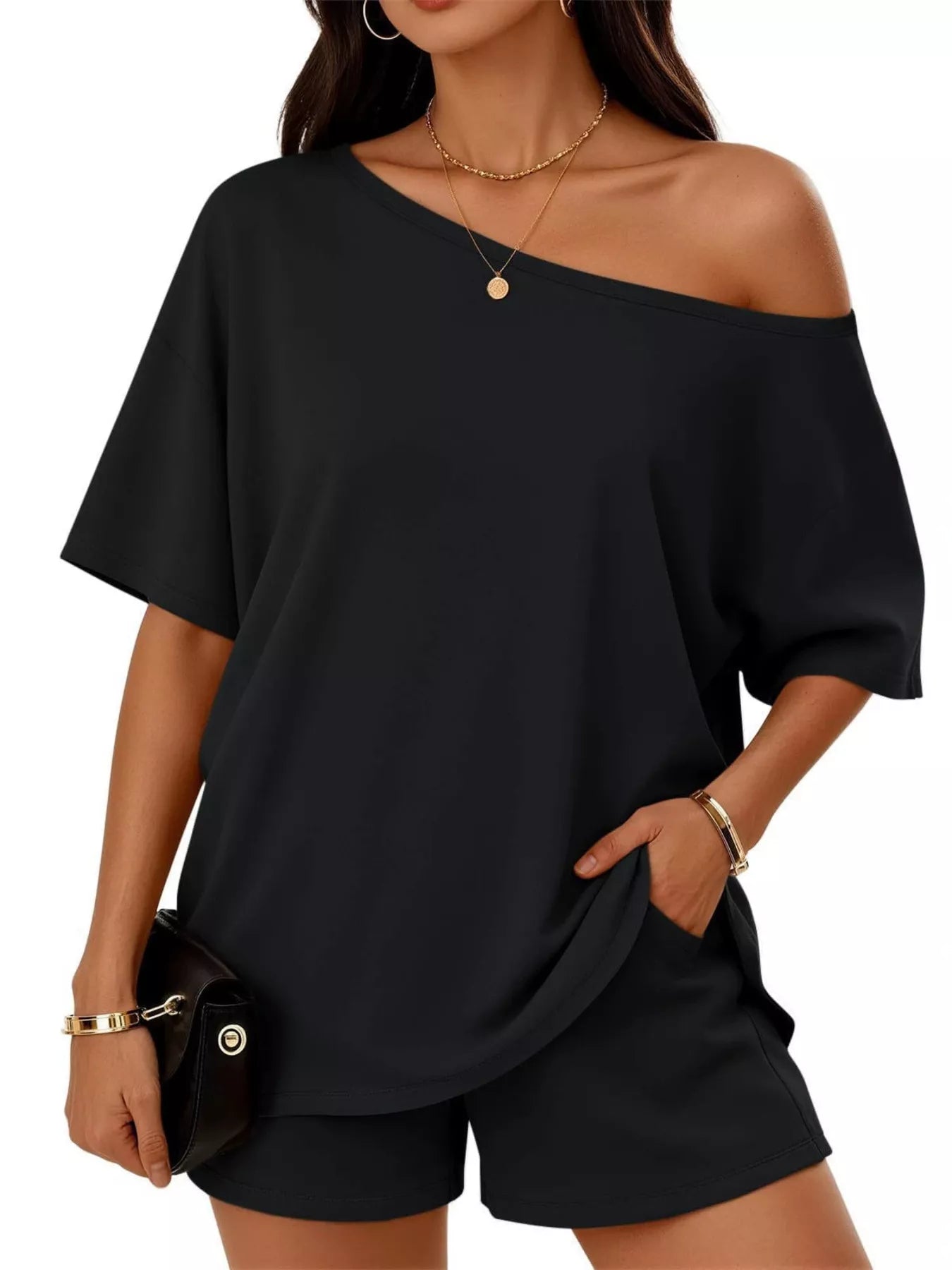 Plus size one-shoulder top and shorts set from Plush Fashion Hub, stylish and comfortable for casual wear.