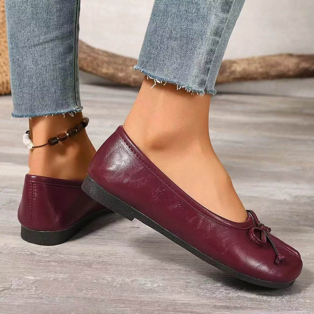 Trendsi Bow Decor Split Toe Slip-On Shoes featuring a stylish bow detail and split toe design, casual footwear for women.
