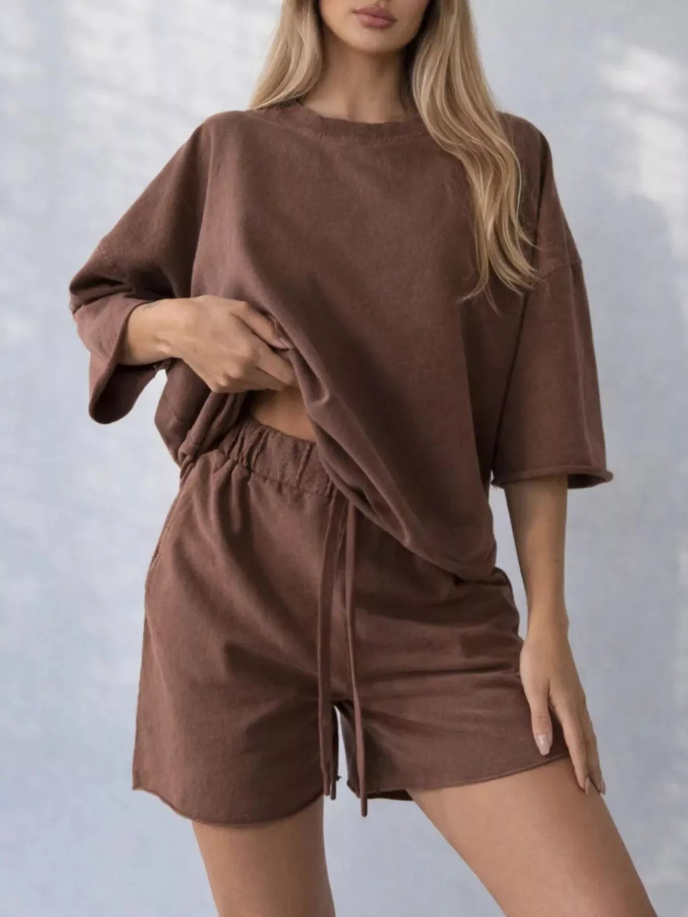 Vintage wash oversized lounge set with tee and shorts by Trendsi, relaxed fit, soft fabric, suitable for casual and comfortable wear