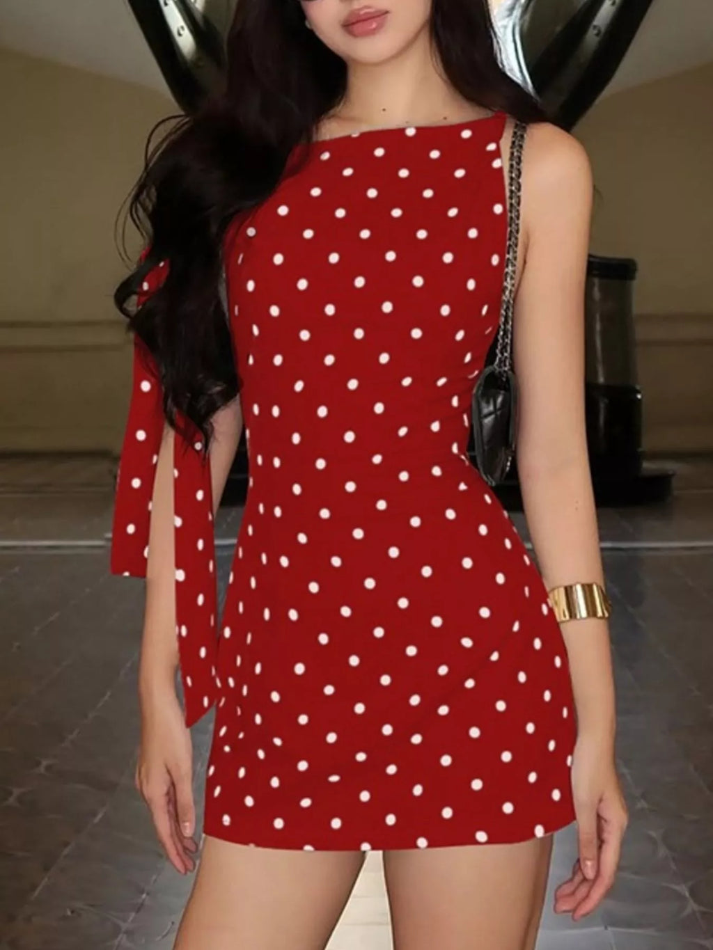 Polka dot sleeveless mini dress with bow accents by Shopimist, featuring a fitted waist and playful pattern.
