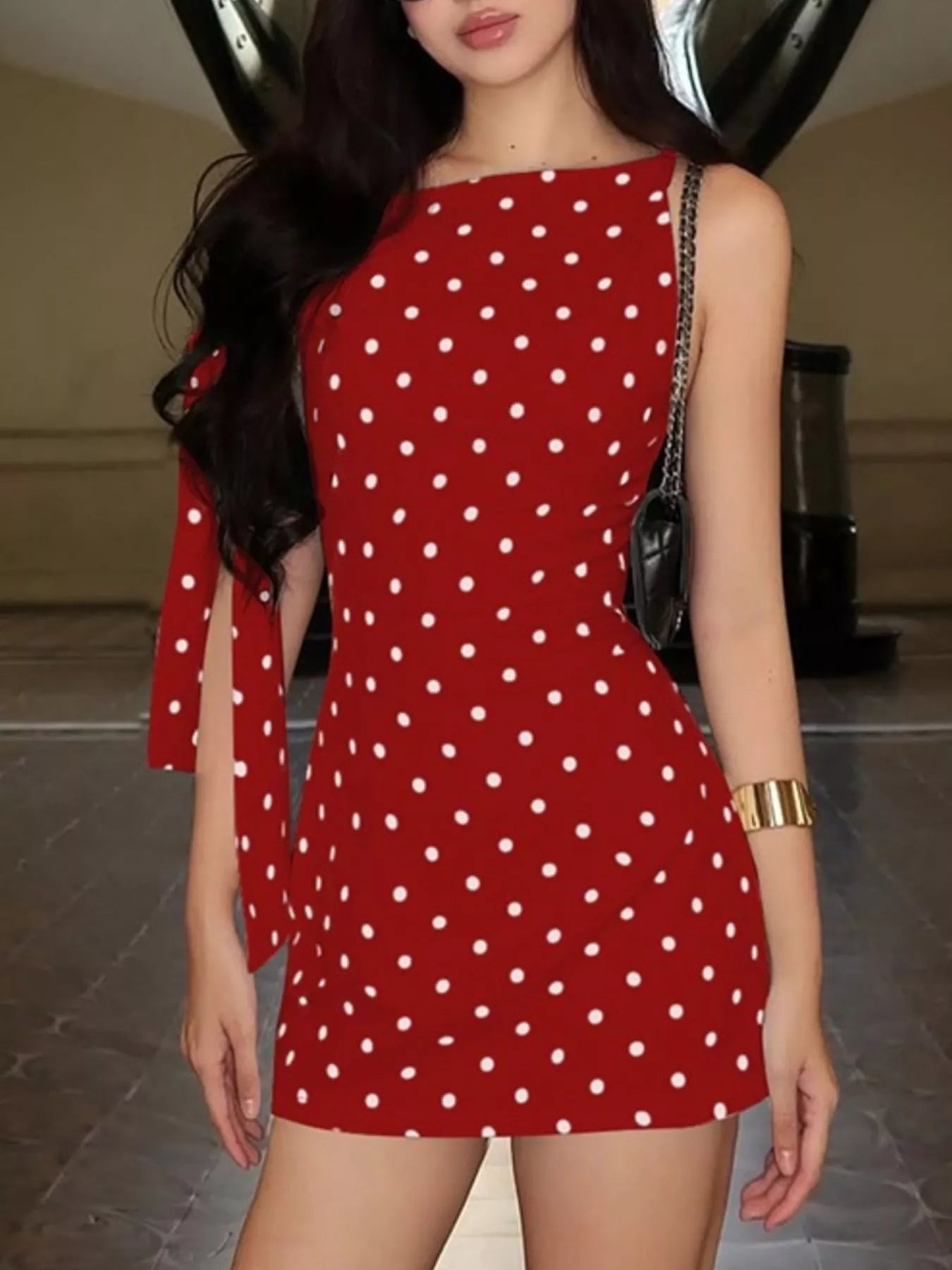 Polka dot sleeveless mini dress with bow accents by Shopimist, featuring a fitted waist and playful pattern.