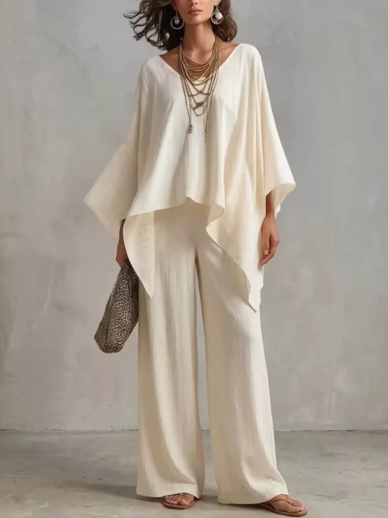 Plus size V-neck loungewear set from Plush Fashion Hub featuring a comfortable top and matching pants for relaxed wear.