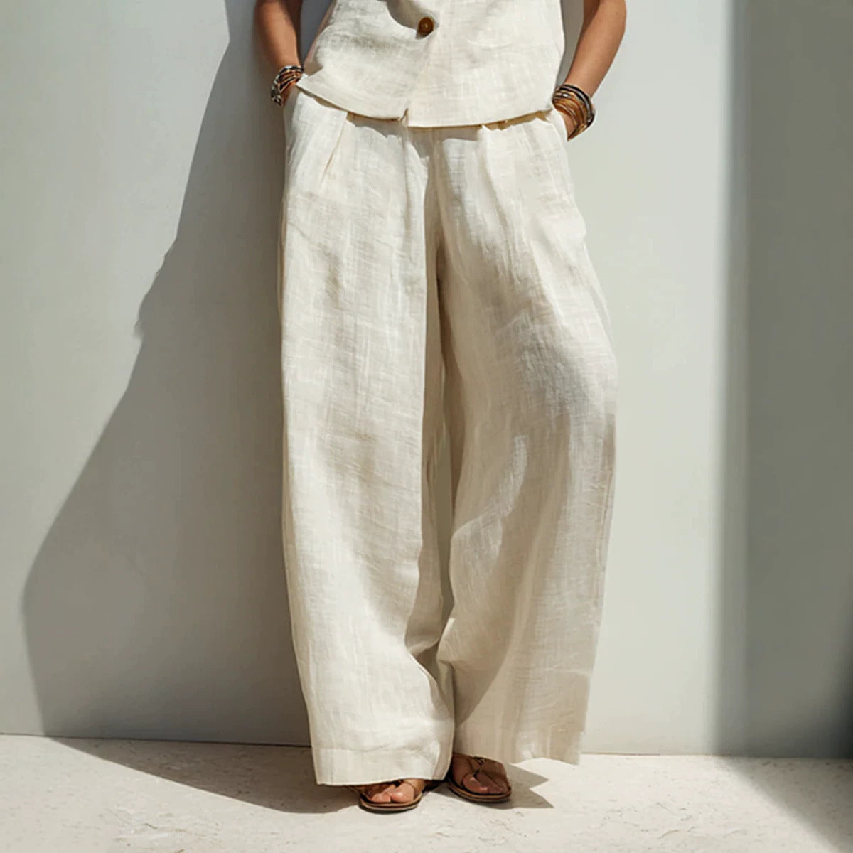 FitiqueFit linen blend vest and high-waist wide-leg pants set in multiple colors, featuring a V-neck buttoned vest and relaxed pants.