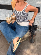 Striped scoop neck tank top from Trendsi featuring a casual fit with vertical stripes and sleeveless design.