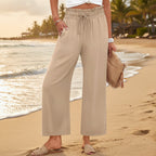 Women's wide-leg cropped pants by FitiqueFit with lace trim and pockets, displayed on a neutral background.