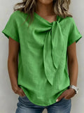 Women’s loose-fit short sleeve casual pullover T-shirt by FitiqueFit, shown in a relaxed fit with a round neckline and casual style.
