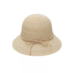 Woven straw bucket hat with decorative band by Plush Fashion Hub, featuring a wide brim and stylish design for summer wear.