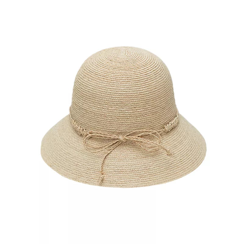 Woven straw bucket hat with decorative band by Plush Fashion Hub, featuring a wide brim and stylish design for summer wear.