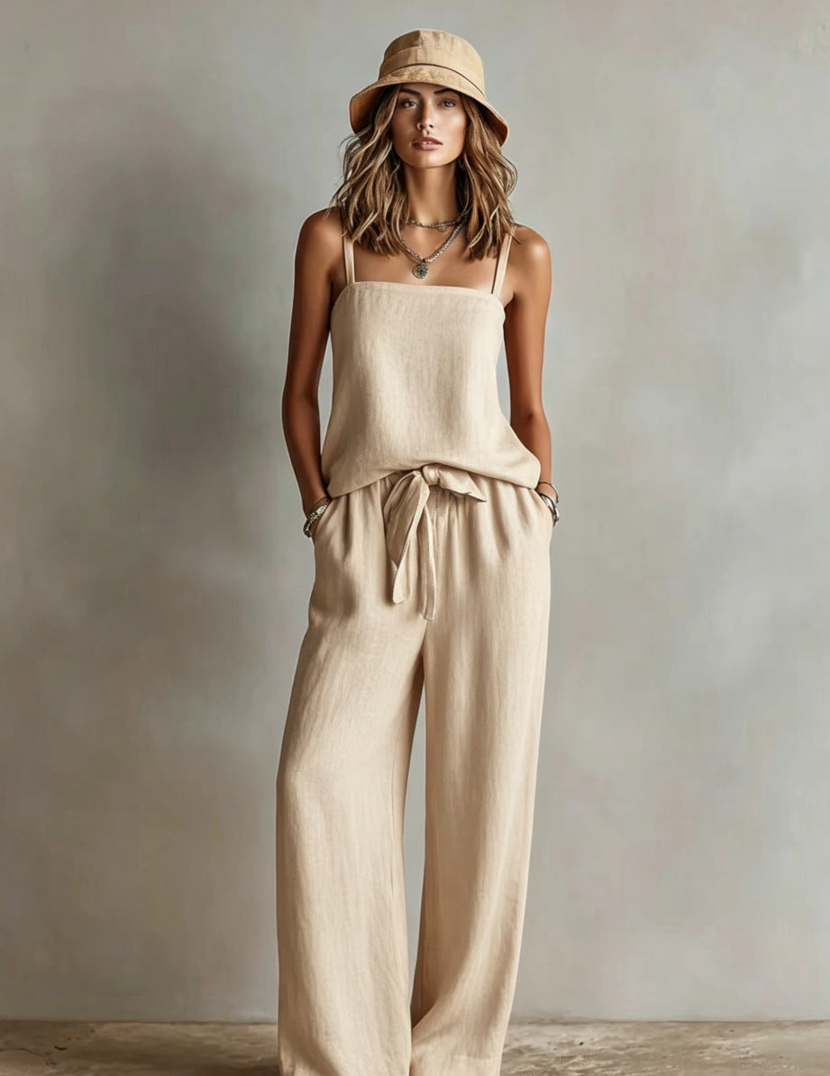 Women's casual FitiqueFit spaghetti strap cami top and wide-leg pants two-piece set, shown in a relaxed fit with neutral colors.