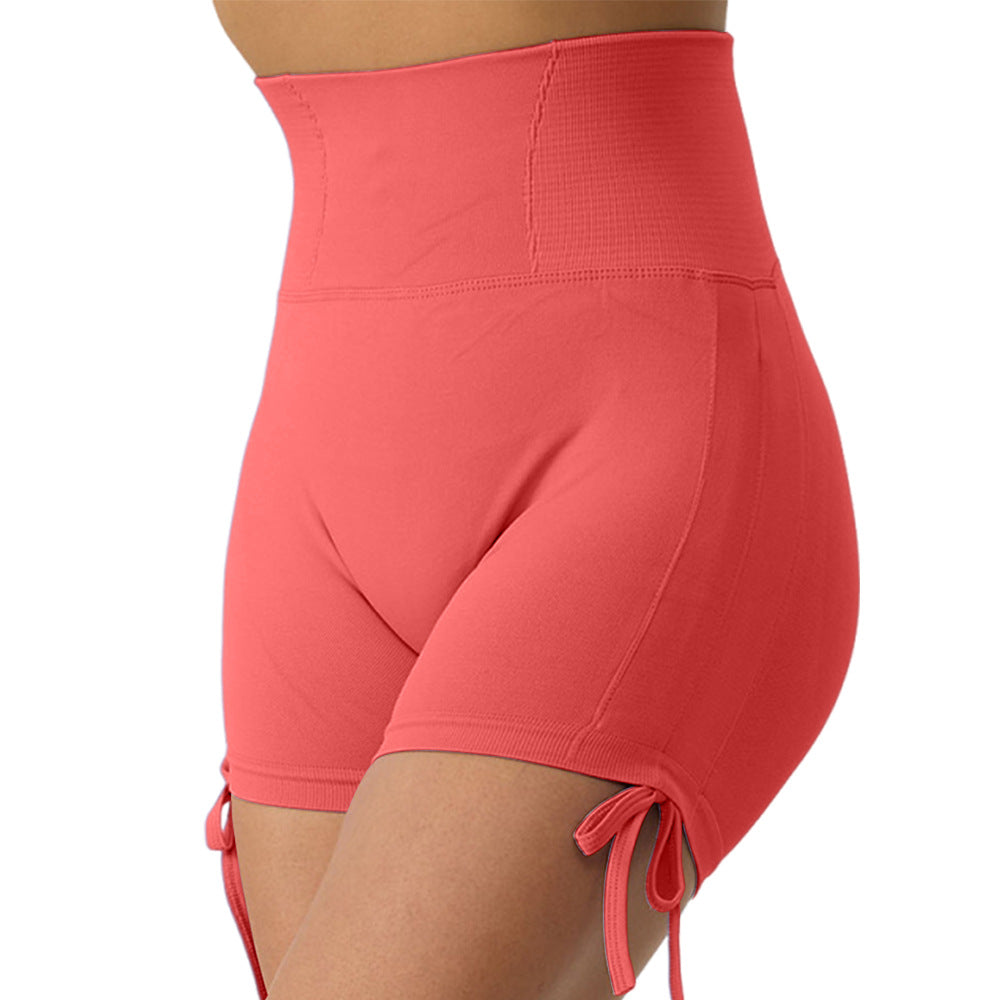 Seamless peach-colored high-waist yoga leggings for women, 3/4 length fitness leggings from Plush Fashion Hub, shown on a model.