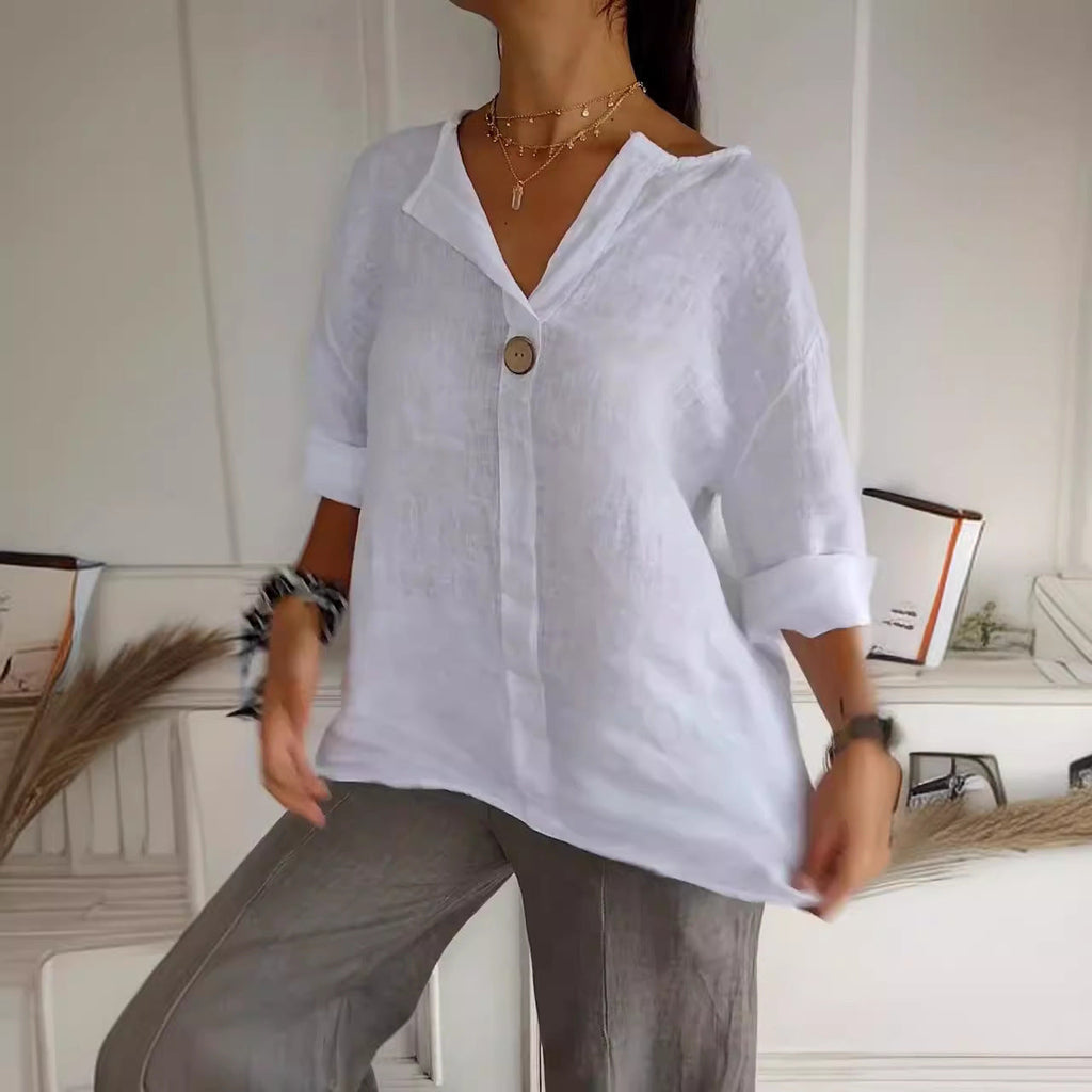 Women's loose fit V-neck long-sleeve button top by FitiqueFit, casual blouse with relaxed fit and stylish V-neck design.