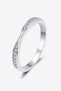 Rhodium-plated moissanite ring with sparkling gemstone set in elegant band, showcasing fine jewelry craftsmanship.