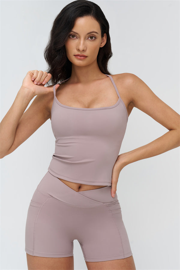 Fitglutes Activewear crop top and shorts 2-piece set, gym and workout clothes, stylish sportswear for active fitness routines.