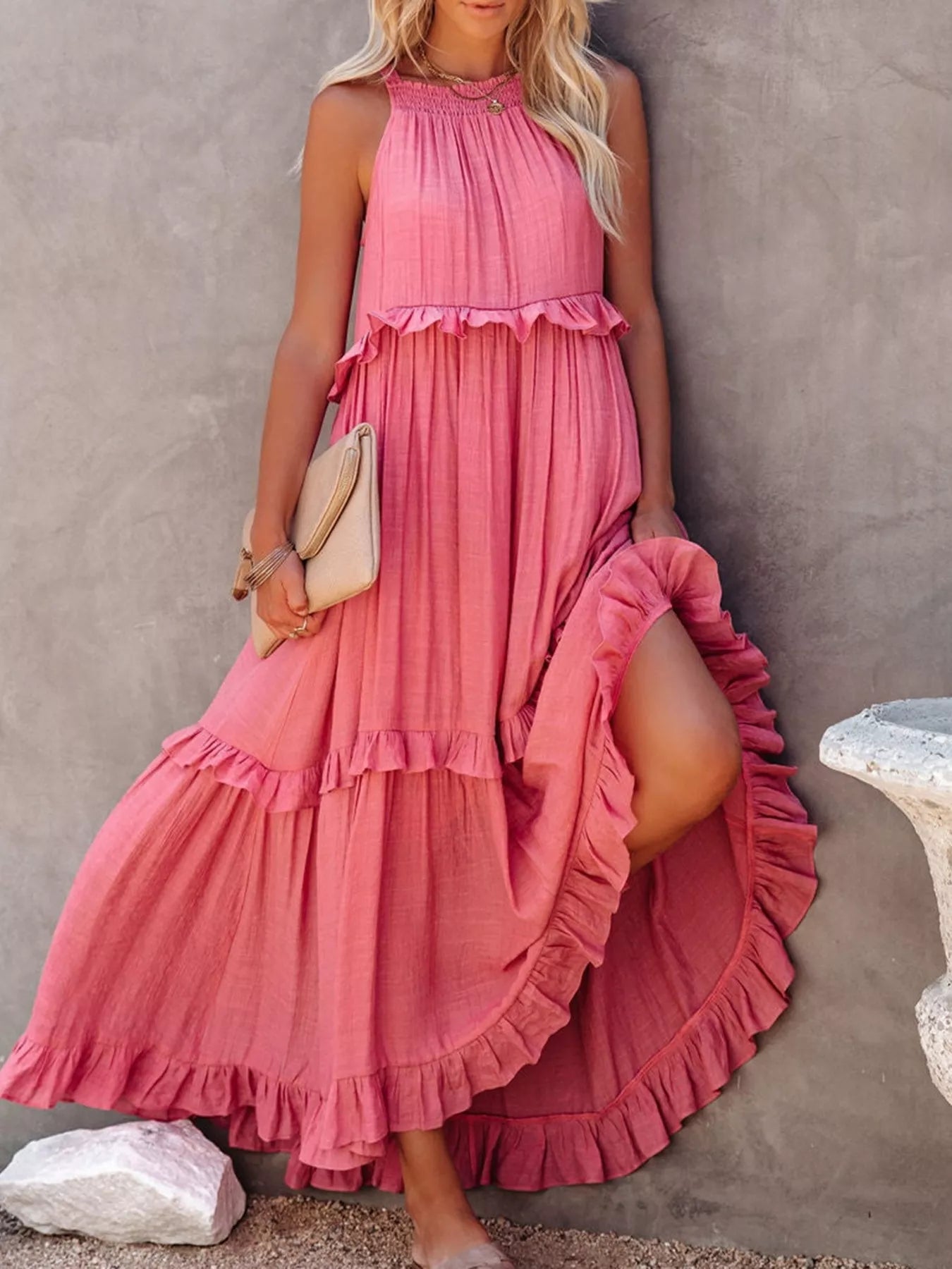 Sleeveless ruffled tiered maxi dress by Plush Fashion Hub featuring flowing fabric and layered ruffle details.