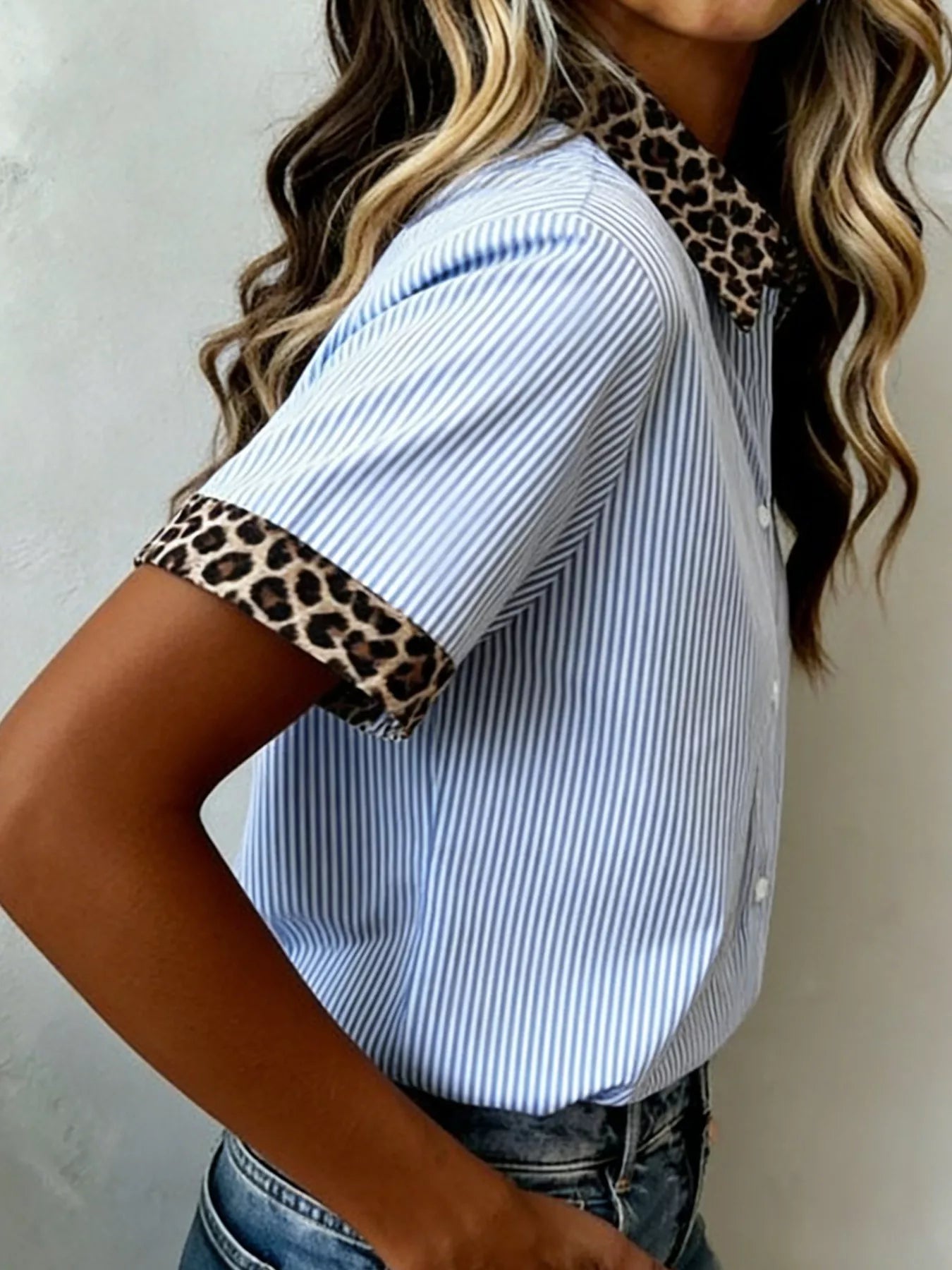 Women's leopard print short sleeve dress with contrast collar by Plush Fashion Hub, featuring a stylish and casual design.