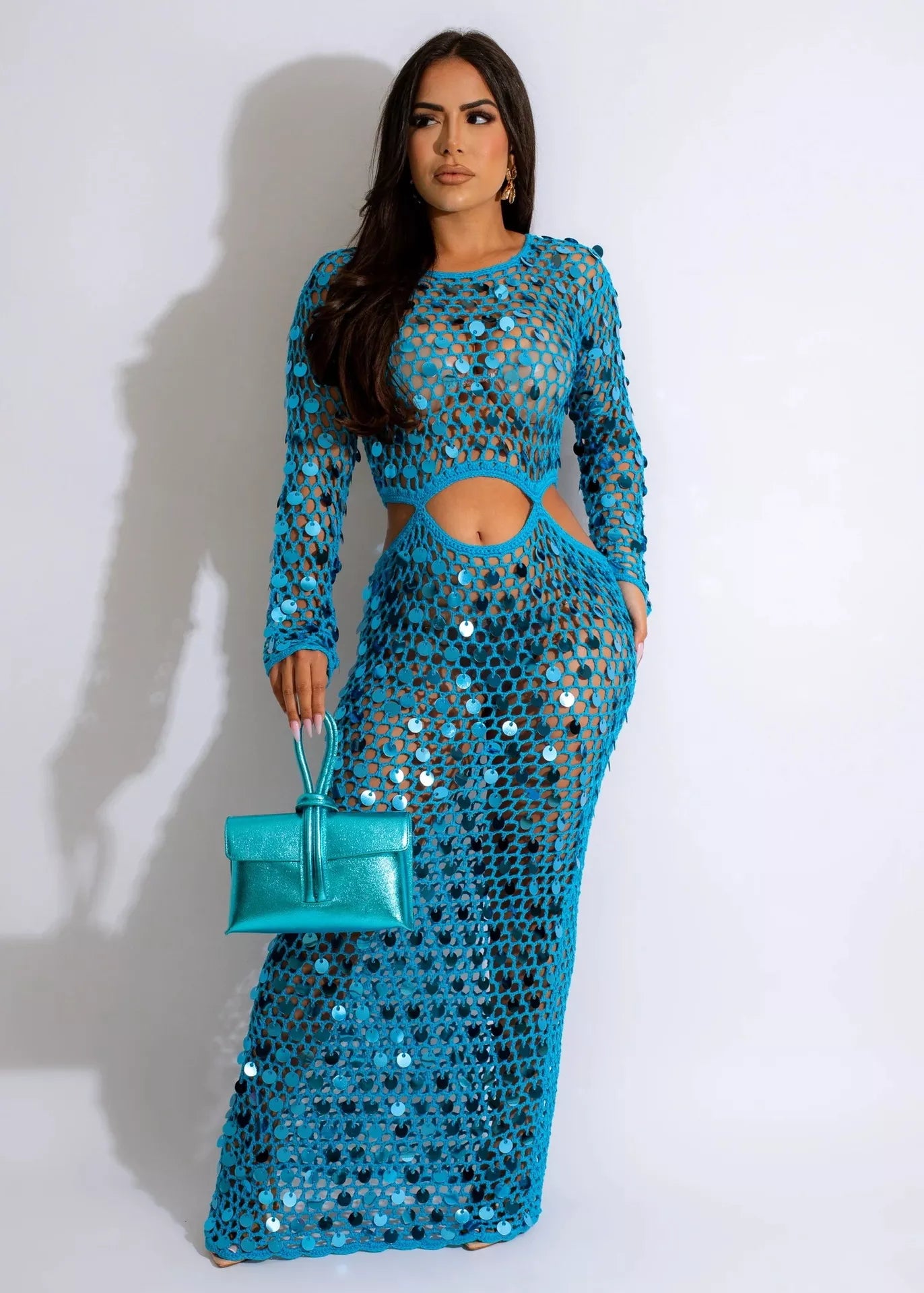 Plush Fashion Hub sequin mesh cutout maxi dress featuring a fitted silhouette and bold sequin embellishments.