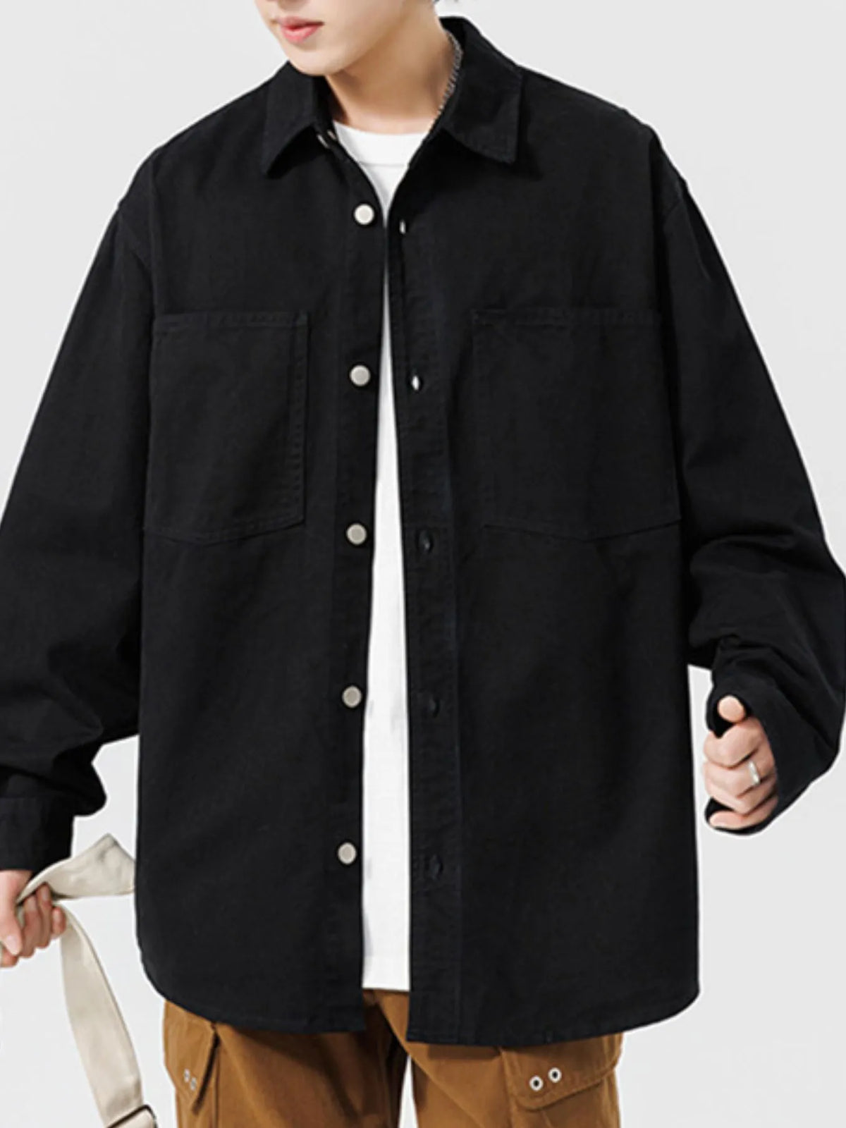 Men's button-up long sleeve shirt from Trendsi, featuring a classic collar and cuffed sleeves in a versatile fabric.