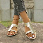 Shopimist toe loop flats sandals featuring a minimalist design with slim straps and a flat sole for casual wear.