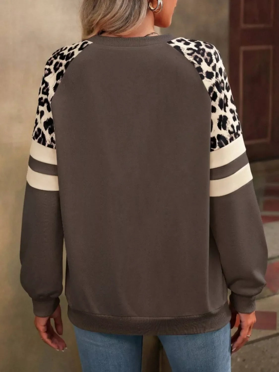 Leopard and striped raglan sleeve sweatshirt by Simply Love featuring a casual, stylish design with mixed animal and stripe patterns.