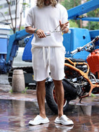Plus size men's short sleeve top and shorts set by Trendsi, casual summer outfit, lightweight fabric, front view.