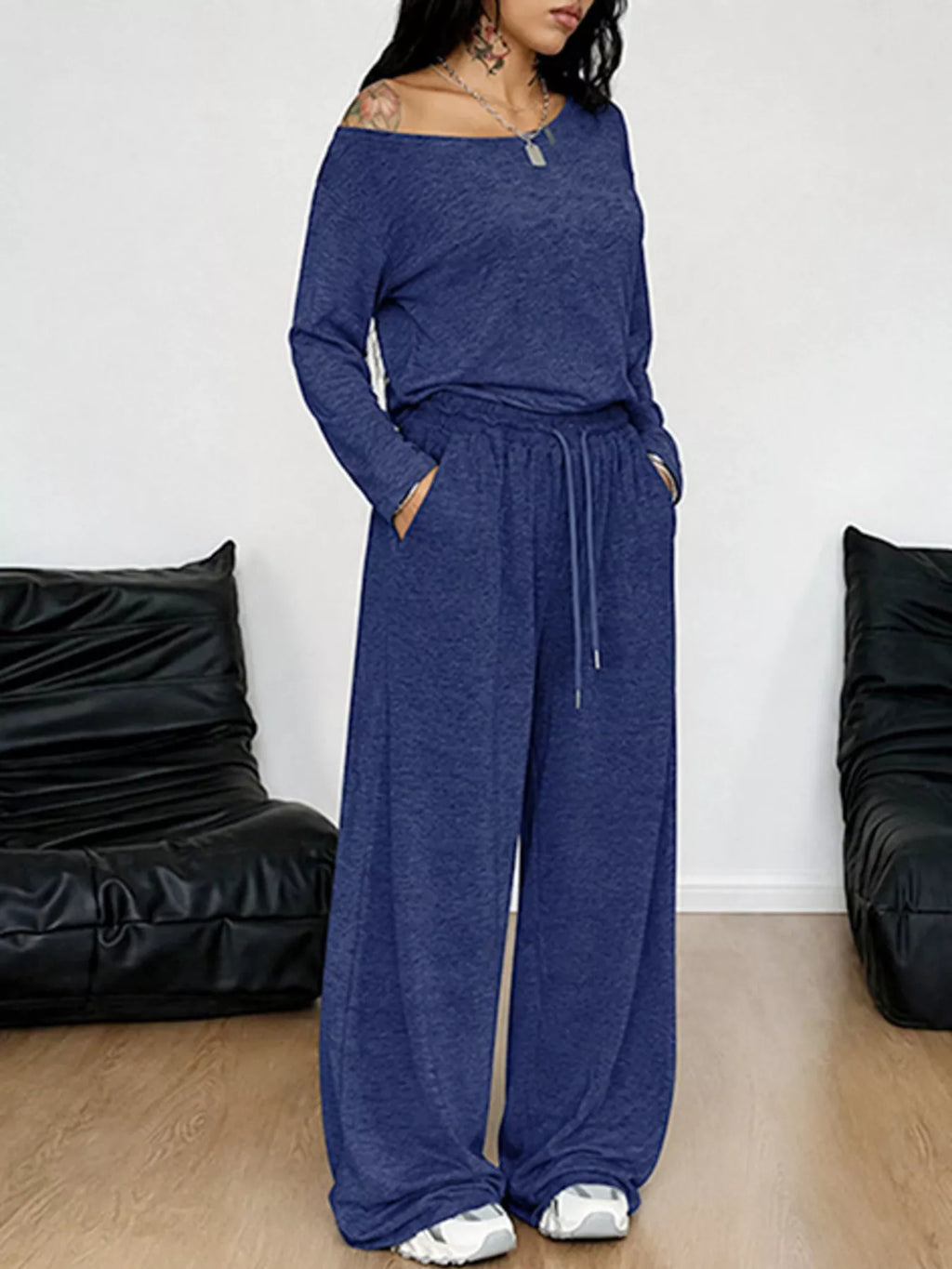 Plus size Trendsi loose fit one-shoulder T-shirt and pants set, featuring comfortable, relaxed-fit pants in a full-size fashion style.