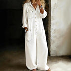 Women's vintage washed wide-leg jumpsuit with pockets from Plush Fashion Hub, featuring a relaxed fit and stylish design.